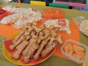 Orange (Zuma): carrot sticks, orange milk bottle sweets and dog bone cookies iced with orange squiggles