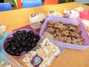 Purple (Everest): grapes, purple milk bottles, purple Beacon marshmallows and snowflake cookies iced with purple
